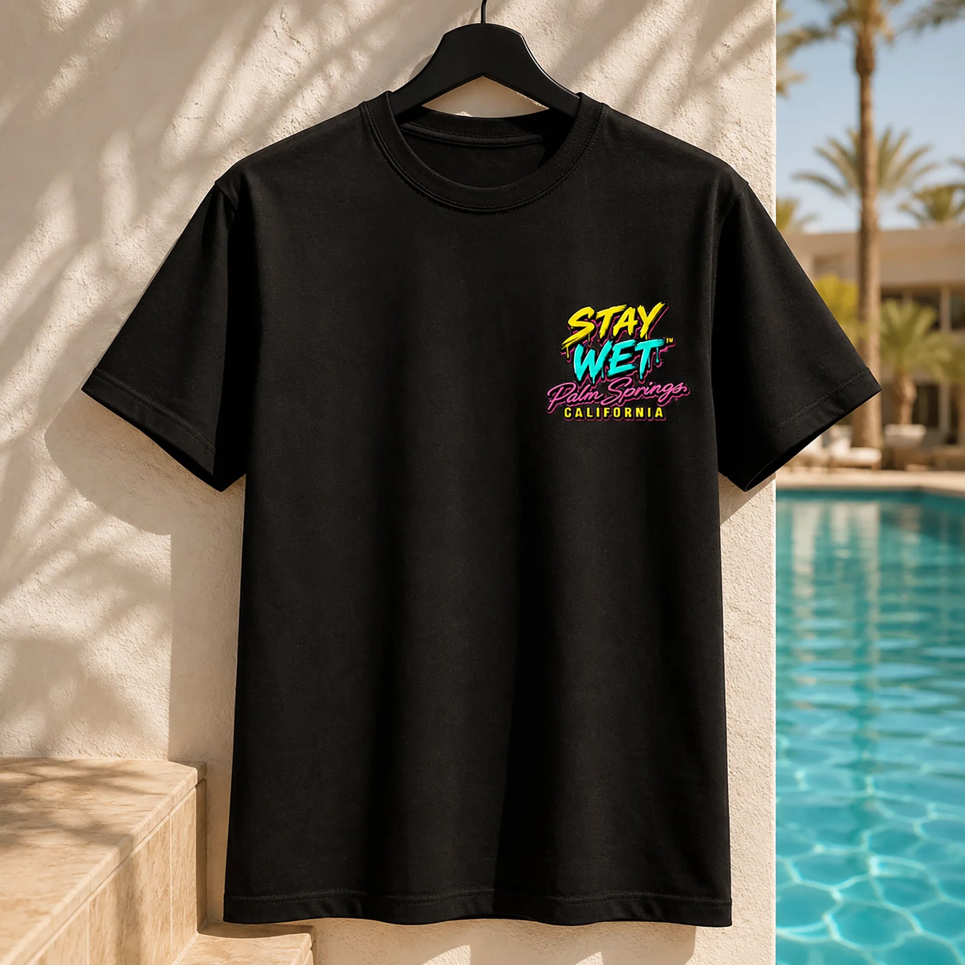 Black Stay Wet Hot Lips at Sunset tee with small left-chest print, front view