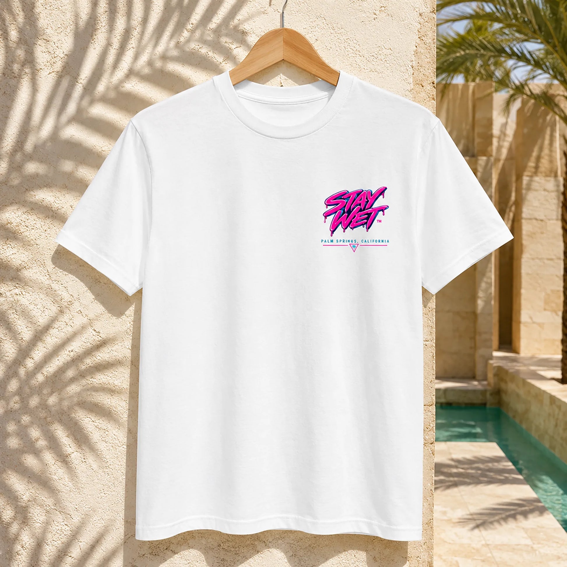 White Stay Wet Palms front and back T-shirt mockup showing the small left-chest print