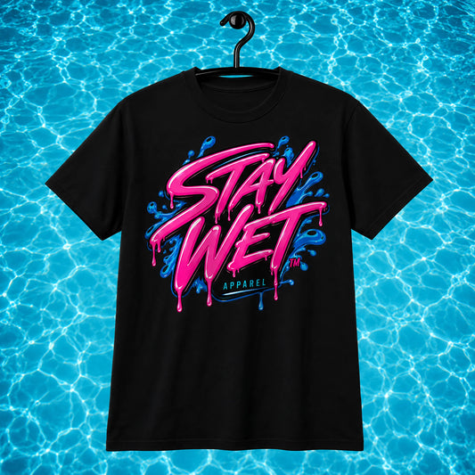 Black Stay Wet Signature Tee with large pink-and-blue front logo on a bright swimming-pool water background.